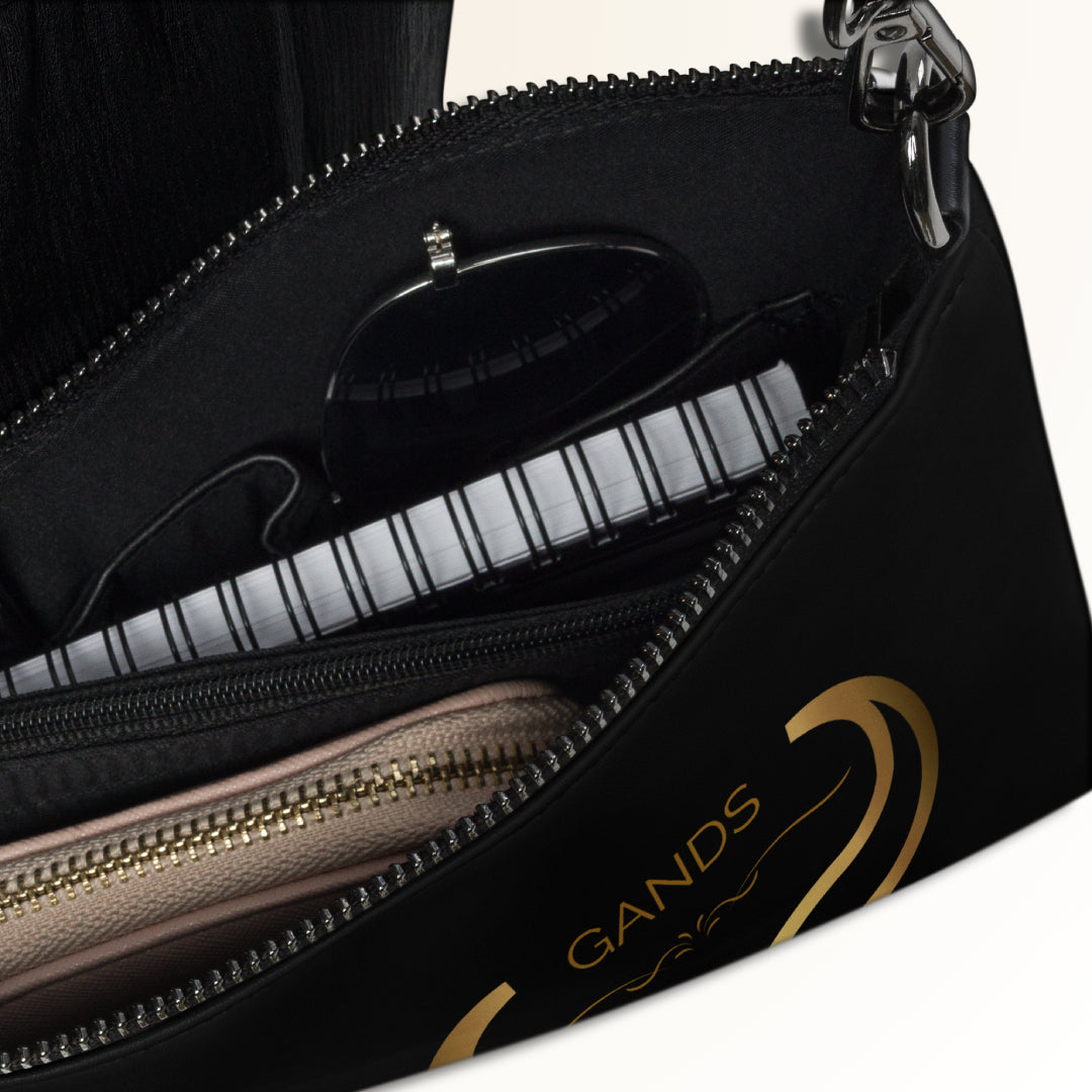 GANDS CLUTCH BAG TAURUS